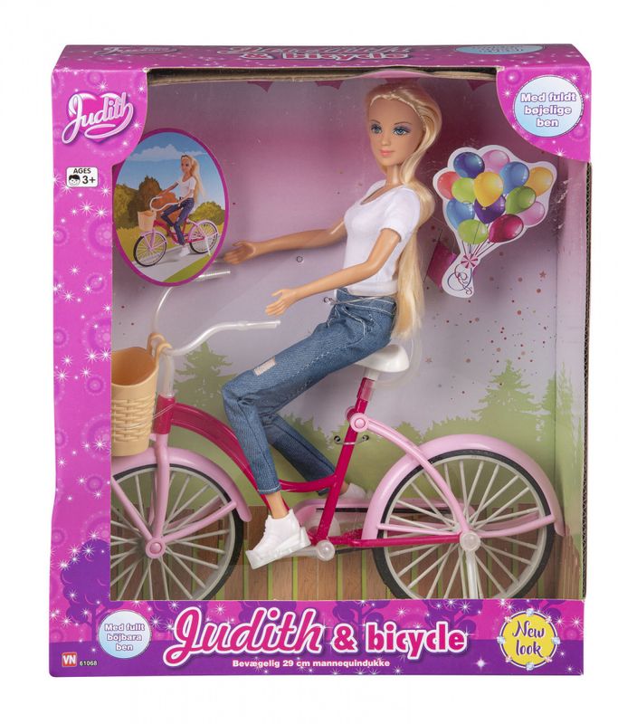 Judith med sykkel og tilbehør